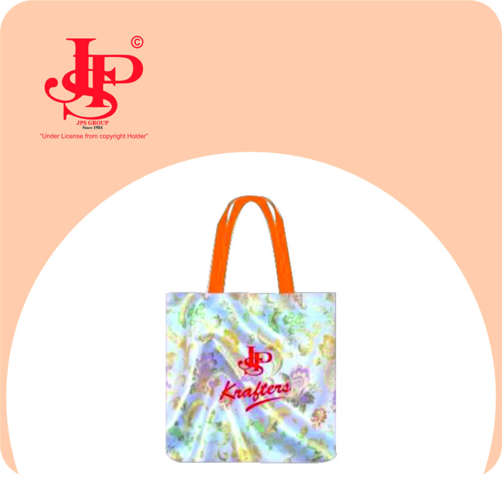 Bright and Bold: JPS Fabric Bags Sparkle in Silver with Vibrant Orange Handles, Making a Statement Wherever You Go
